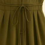 Close-up detail of Olive Reverie Dress, fabric detail