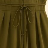 Close-up detail of Olive Reverie Dress, fabric detail