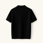 Ribb Polo shown in a lifestyle setting, back angle view