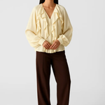 Sheer Blouse shown in a lifestyle setting, alternate view