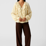 Sheer Blouse shown in a lifestyle setting, alternate view