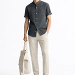 Short Sleeve Stand Collar Shirt & Straight Leg Linen Pants shown in a lifestyle setting, cropped view