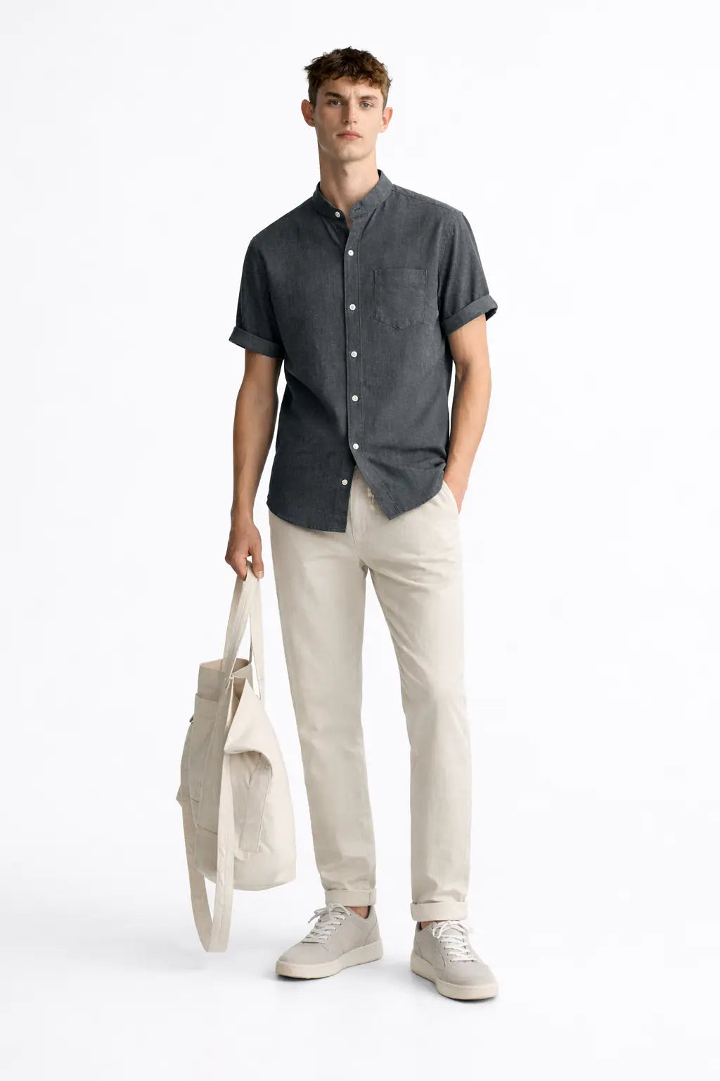 Short Sleeve Stand Collar Shirt & Straight Leg Linen Pants shown in a lifestyle setting, cropped view