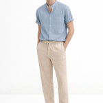 Short Sleeve Stand Collar Shirt & Straight Leg Linen Pants shown in a lifestyle setting, full length view