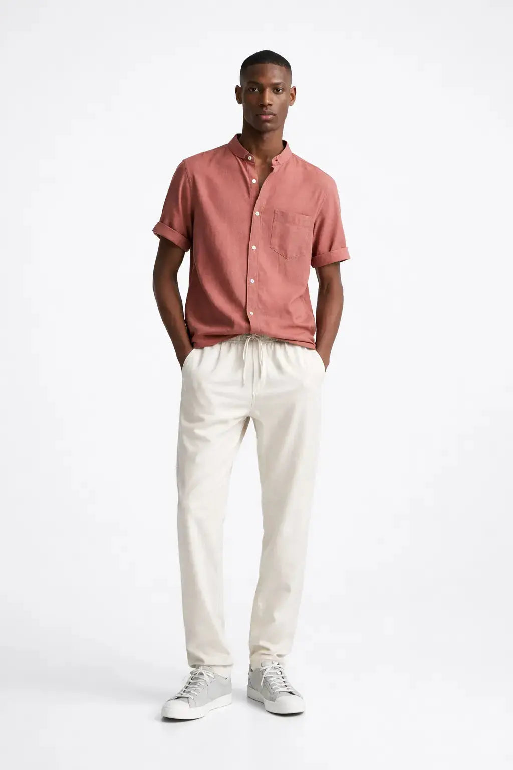 Short Sleeve Stand Collar Shirt & Straight Leg Linen Pants shown in a lifestyle setting, side angle view