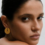 Solina Earrings shown in a lifestyle setting, alternate view