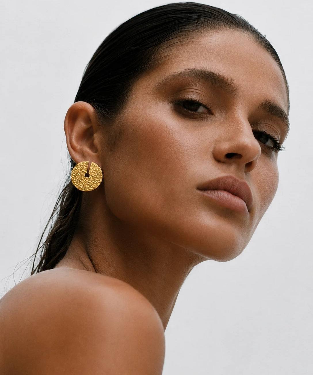 Solina Earrings shown in a lifestyle setting