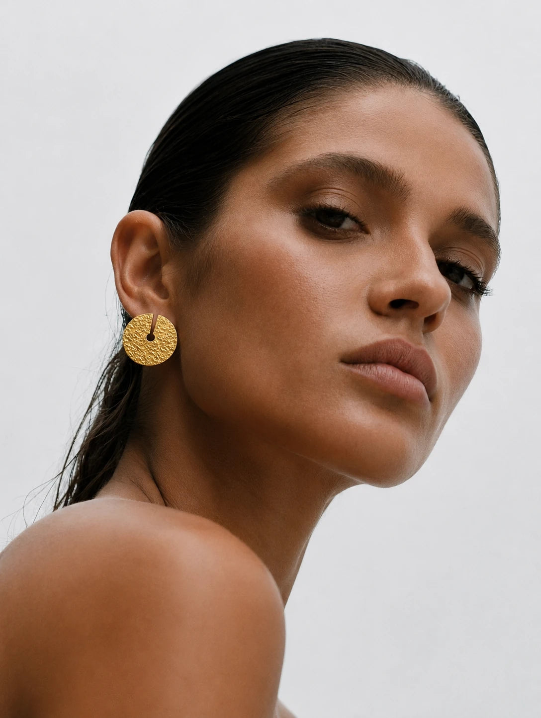 Solina Earrings shown in a lifestyle setting