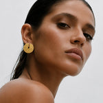 Solina Earrings shown in a lifestyle setting