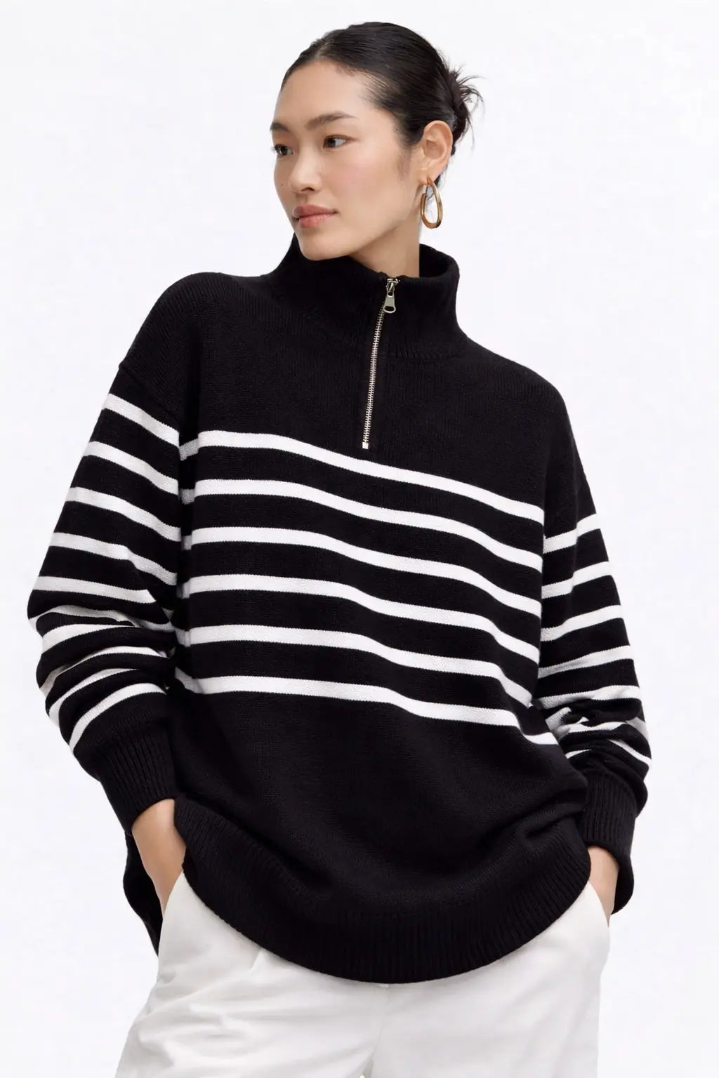 Striped Knit Sweater shown in a lifestyle setting, cropped view