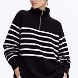 Striped Knit Sweater shown in a lifestyle setting, cropped view