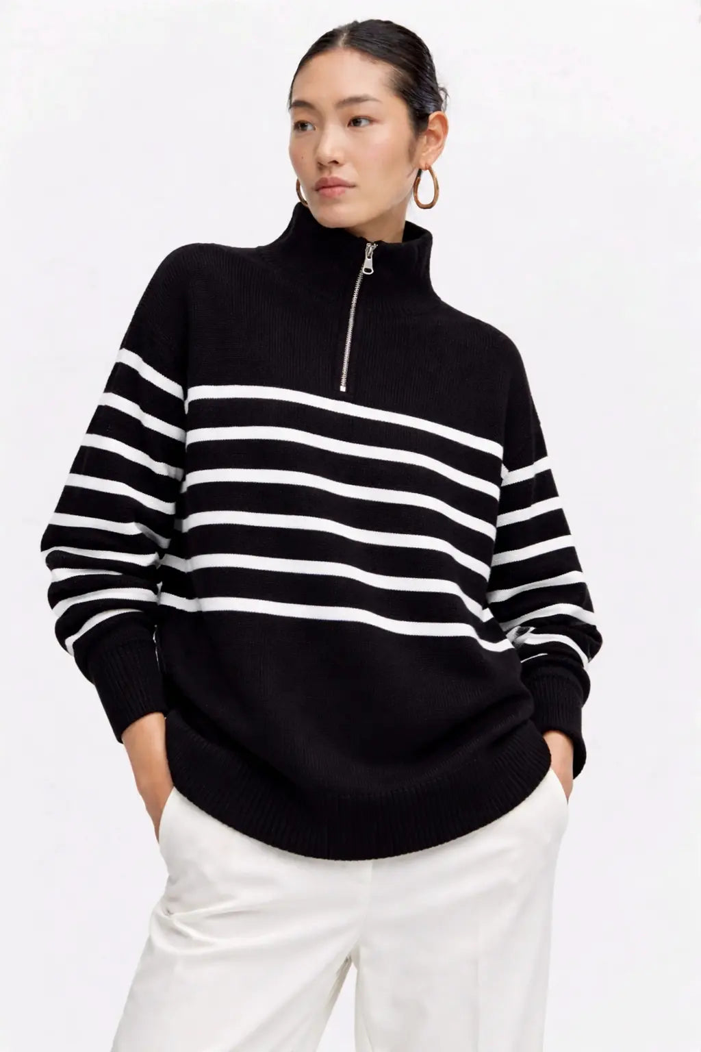 Striped Knit Sweater shown in a lifestyle setting, full length view