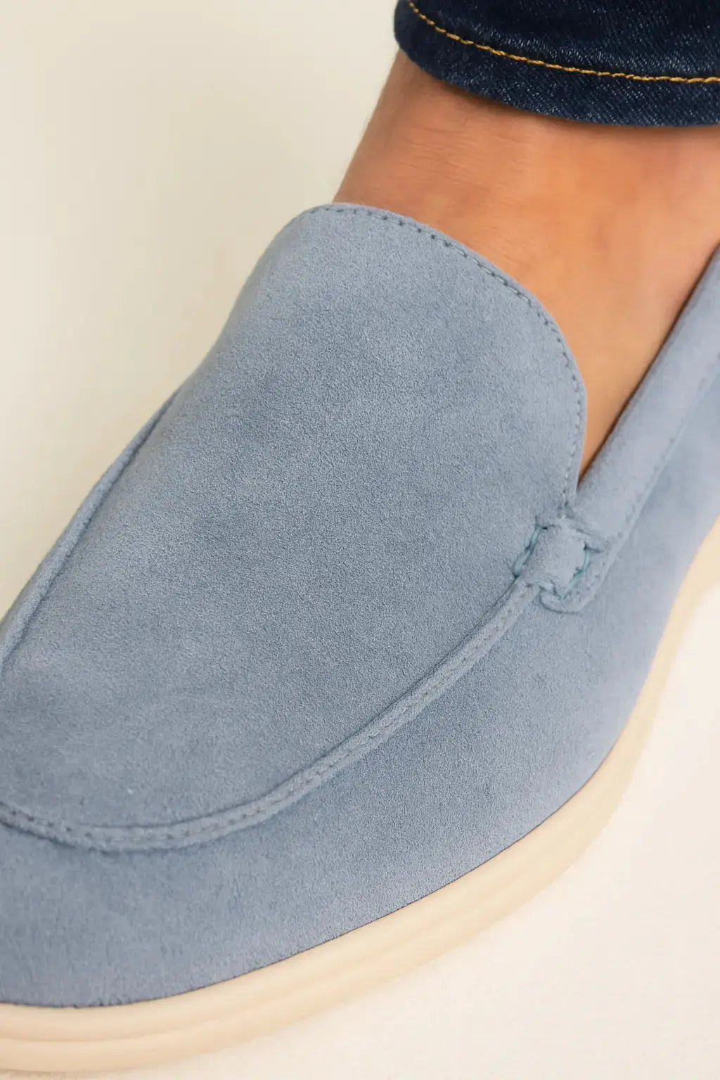Close-up detail of THE CAPRICE SUEDE LOAFERS, fabric detail