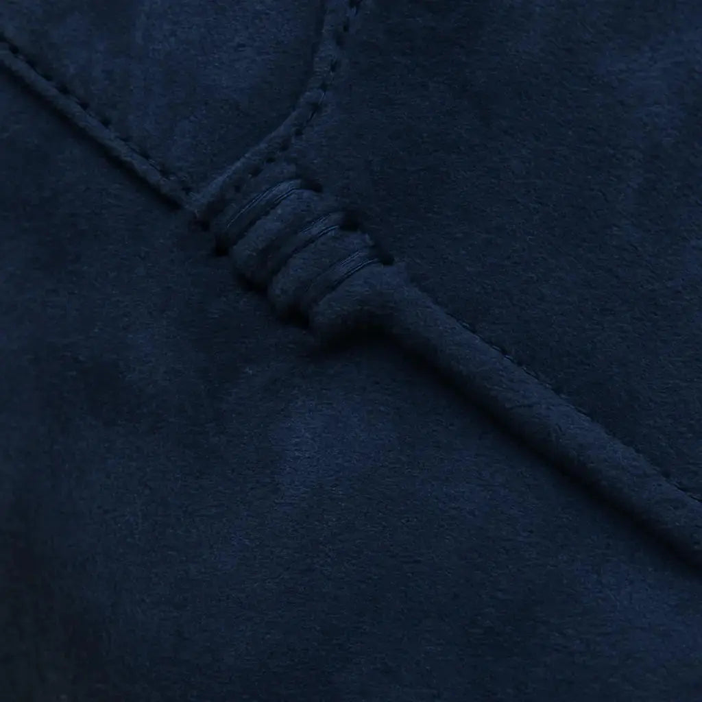 Close-up detail of THE CAPRICE SUEDE LOAFERS, texture detail