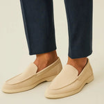 THE CAPRICE SUEDE LOAFERS shown in a lifestyle setting, back angle view