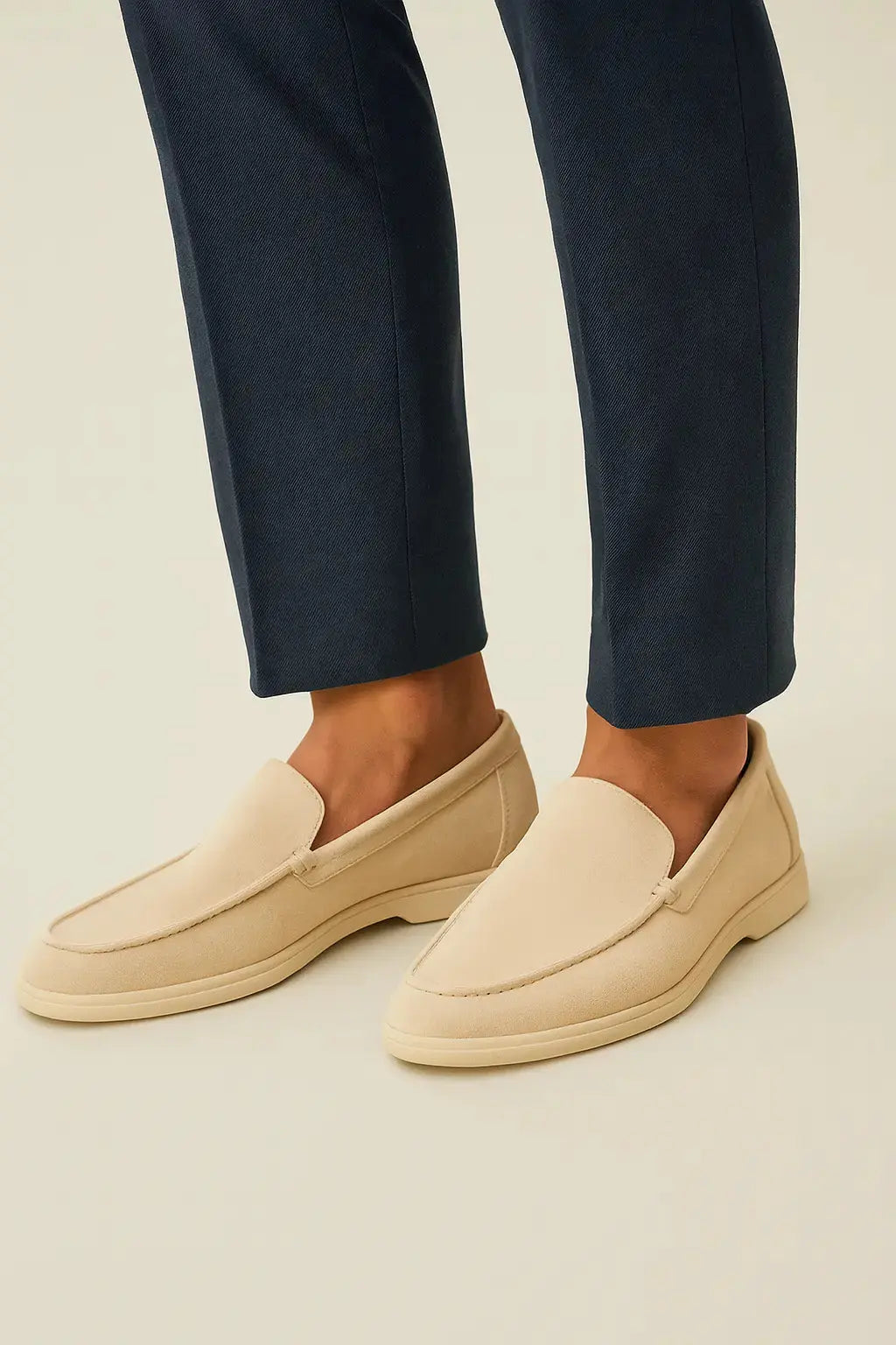 THE CAPRICE SUEDE LOAFERS shown in a lifestyle setting, back angle view