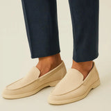 THE CAPRICE SUEDE LOAFERS shown in a lifestyle setting, back angle view