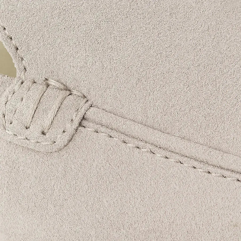 THE CAPRICE SUEDE LOAFERS shown in a lifestyle setting, cropped view
