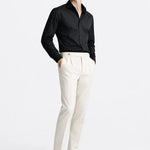 Signature pants shown in a lifestyle setting, alternate view