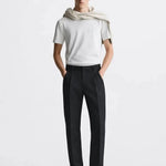 Signature pants shown in a lifestyle setting, full length view