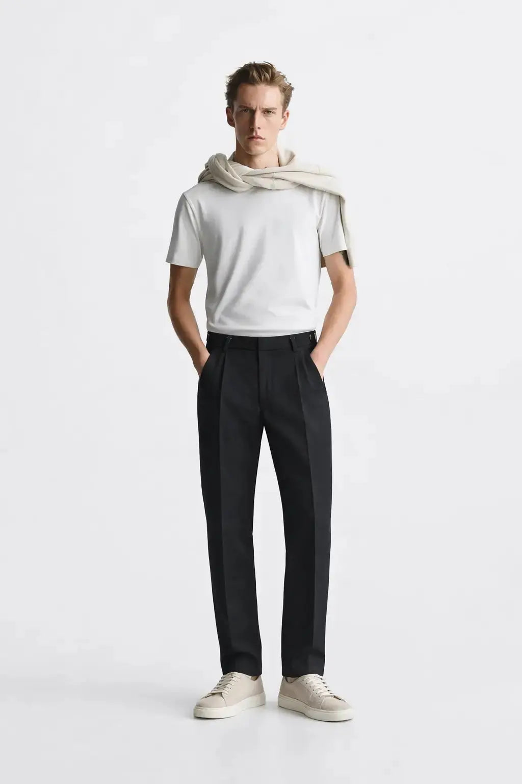 Signature pants shown in a lifestyle setting, full length view