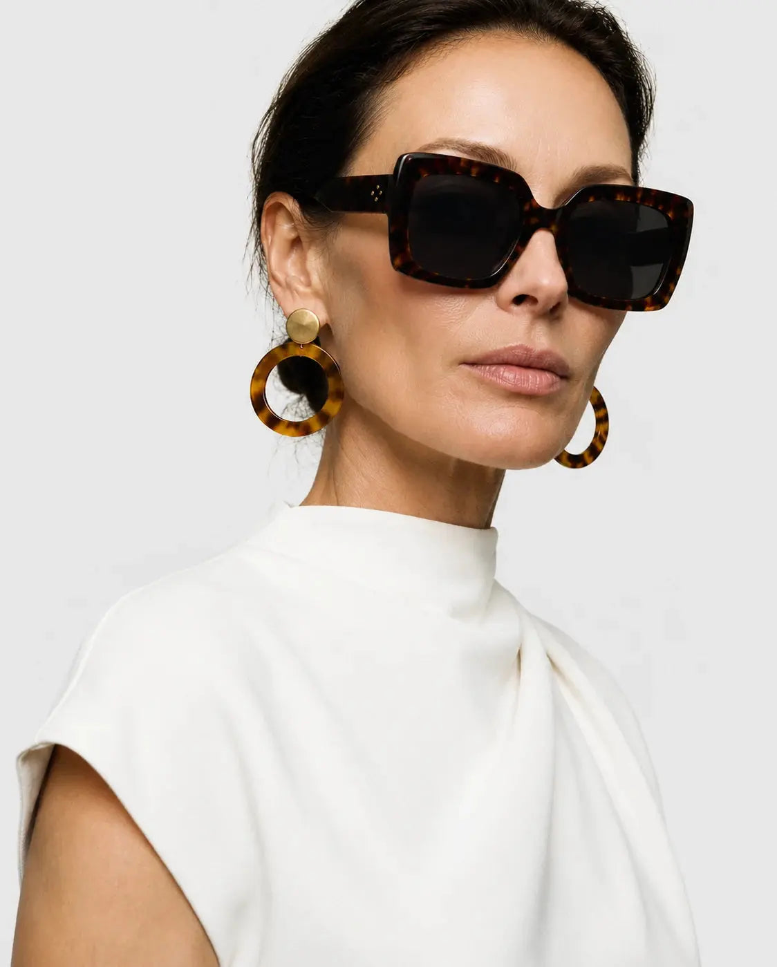 UltraLux Vision Sunglases shown in a lifestyle setting, alternate view