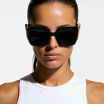 UltraLux Vision Sunglases shown in a lifestyle setting, full length view