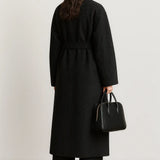 Velour Muse Coat shown in a lifestyle setting, cropped view
