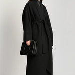 Velour Muse Coat shown in a lifestyle setting, full length view