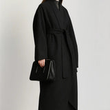 Velour Muse Coat shown in a lifestyle setting, full length view